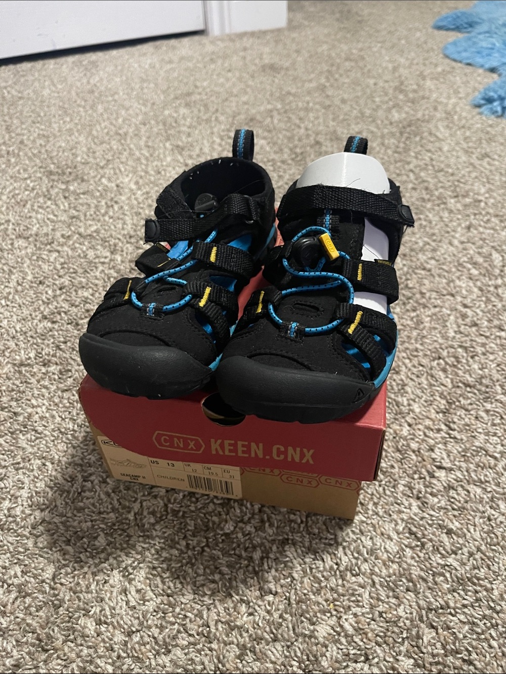 Keen Kids Black Sandals with Blue and Yellow Accents